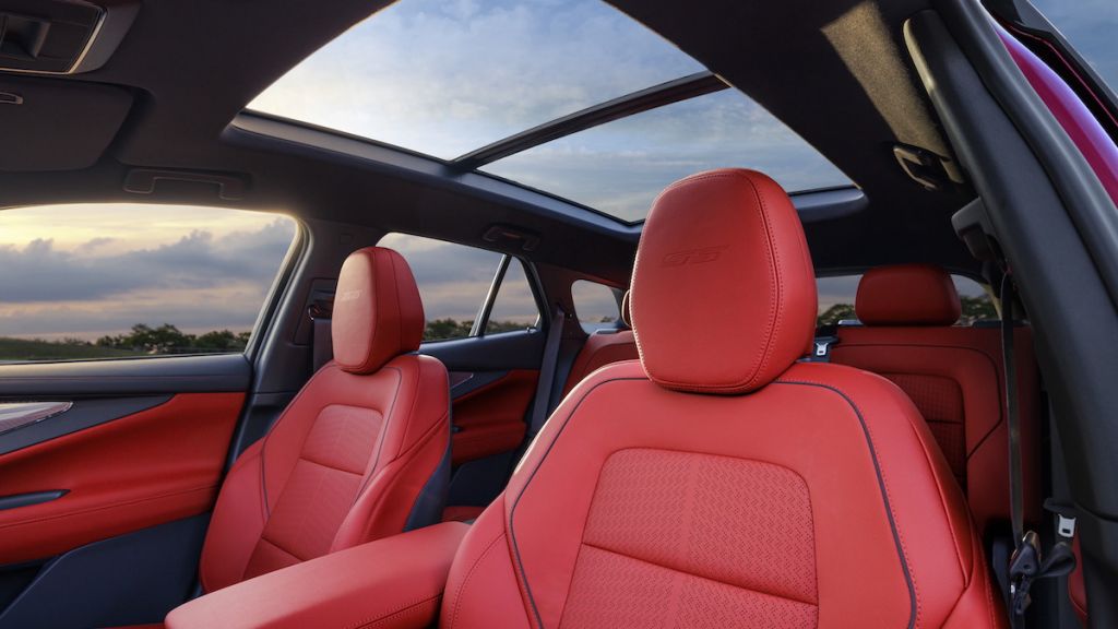 Driver’s side view of 2024 Chevrolet Blazer EV SS interior in Adenaline Red. Preproduction model shown. Actual production model may vary. 2024 Chevrolet Blazer EV available Spring 2023.