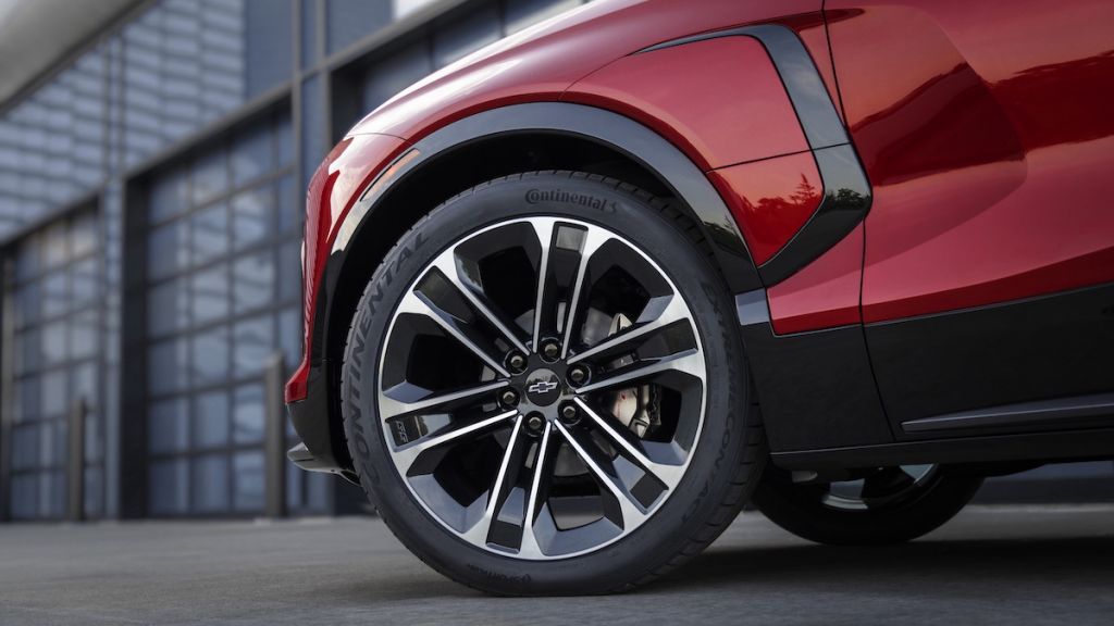 Close up of the front driver’s side wheel on the 2024 Chevrolet Blazer EV SS in Radiant Red Tintcoat. Preproduction model shown. Actual production model may vary. 2024 Chevrolet Blazer EV available Spring 2023.